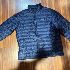 Patagonia Men’s navy down jacket. Size XL. Never worn